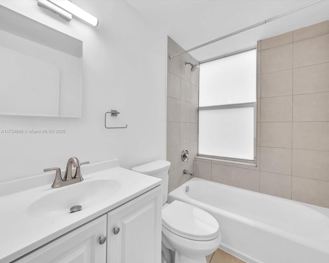 full bathroom featuring shower / bathtub combination, toilet, and vanity