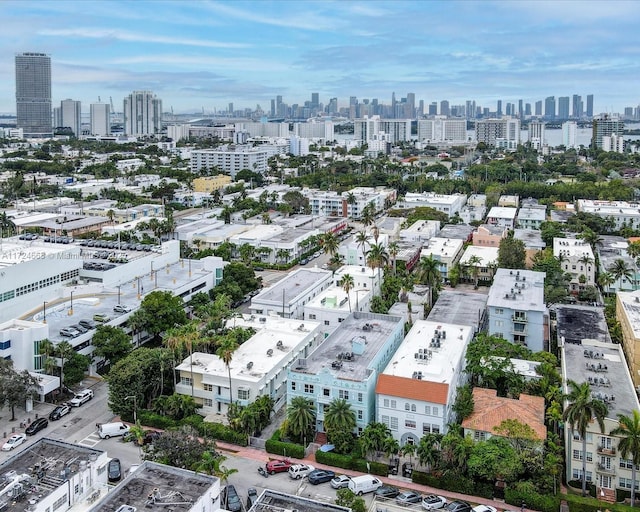 birds eye view of property with a city view