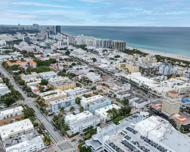 aerial view with a water view and a view of city
