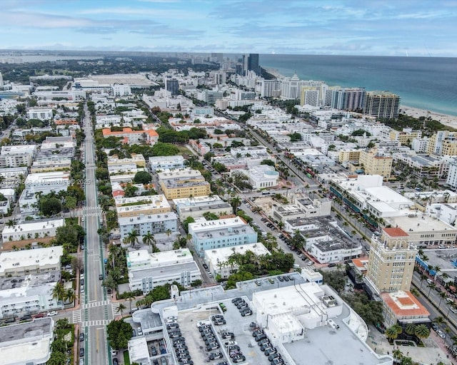 drone / aerial view with a view of city and a water view