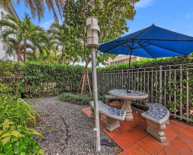 view of patio / terrace with fence