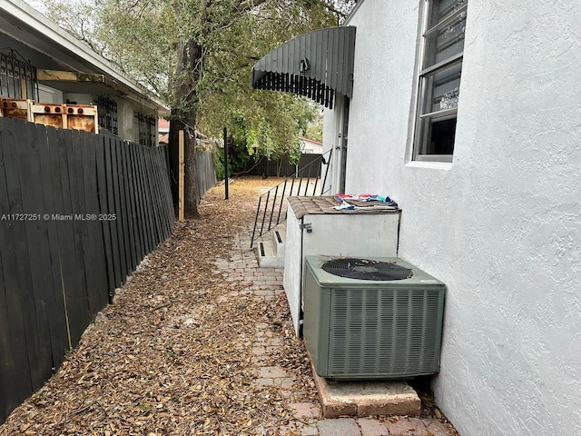 exterior space with central air condition unit