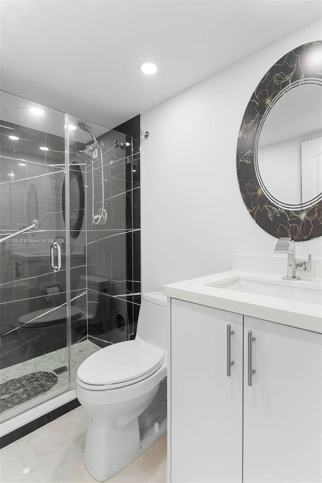 bathroom with toilet, walk in shower, tile patterned floors, and vanity