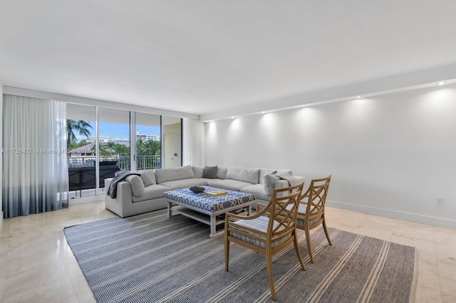 living room with floor to ceiling windows