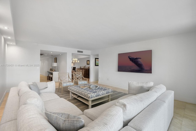 living room featuring a chandelier