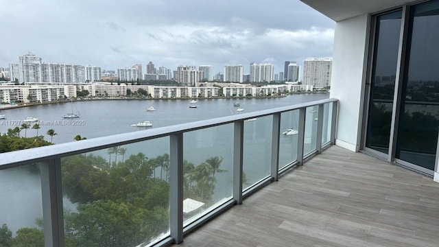 balcony featuring a water view