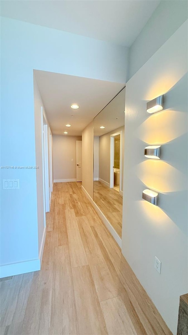 corridor featuring light hardwood / wood-style flooring