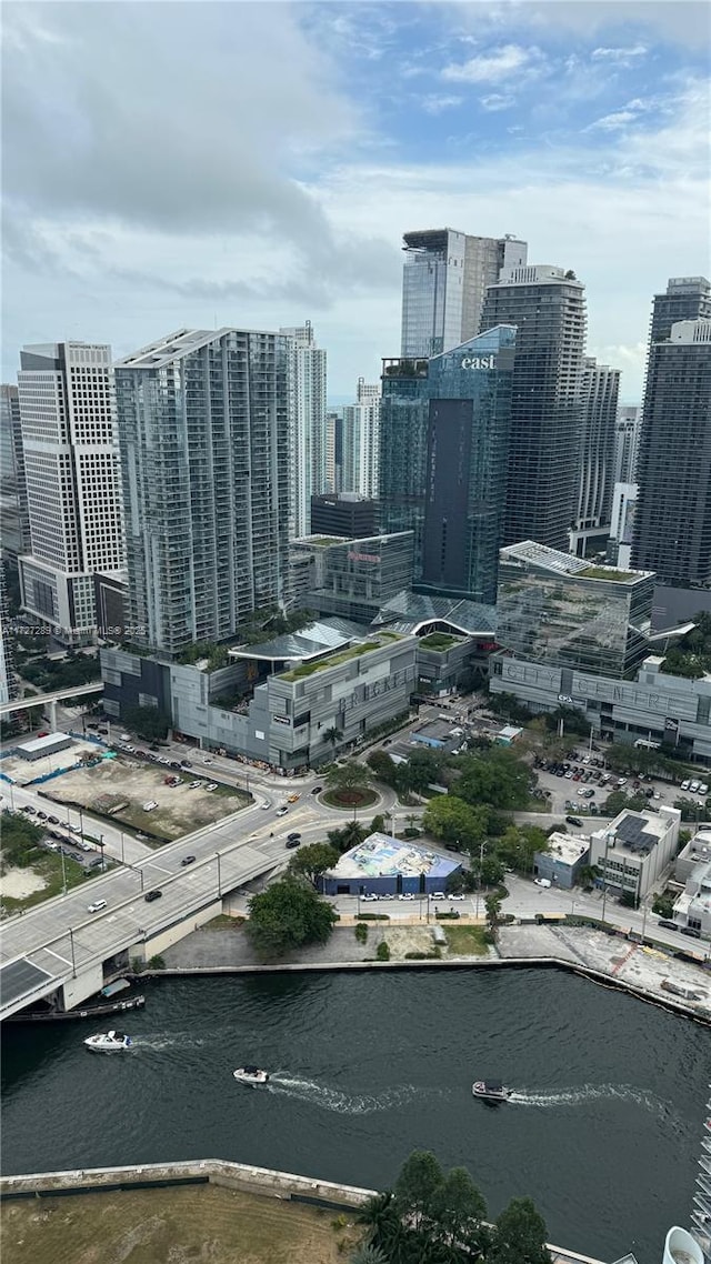 property's view of city featuring a water view