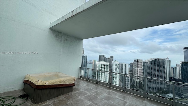 balcony featuring a hot tub