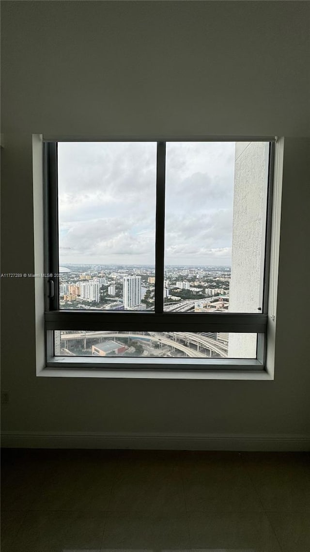 view of tiled spare room