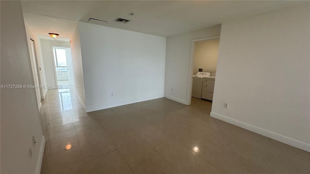 empty room with independent washer and dryer