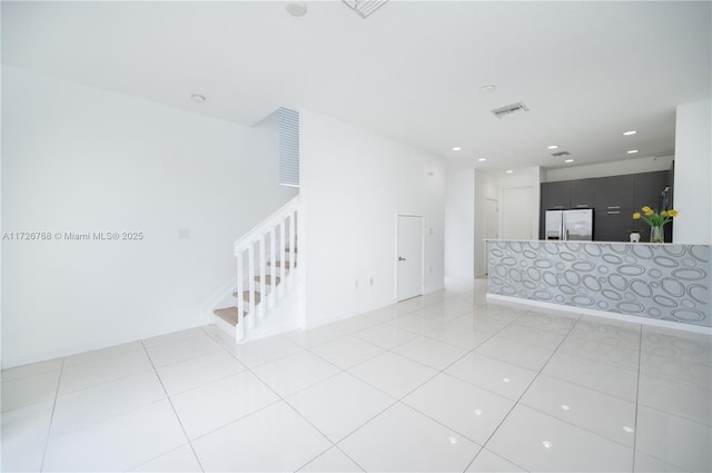 empty room featuring light tile patterned flooring