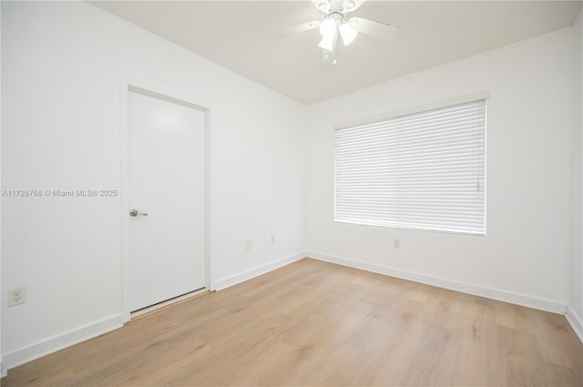 empty room with light hardwood / wood-style floors and ceiling fan