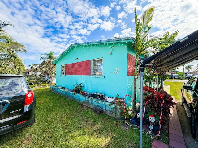 view of home's exterior featuring a yard