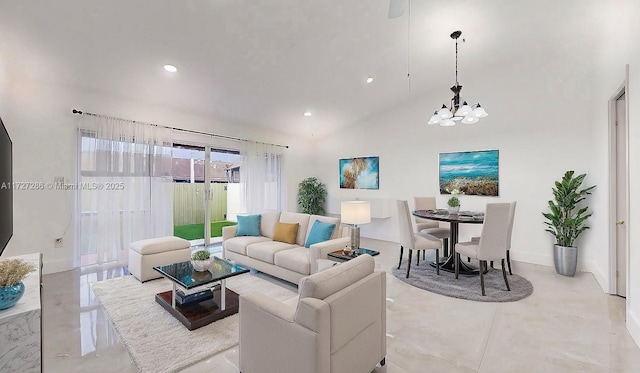 living room featuring a notable chandelier and high vaulted ceiling