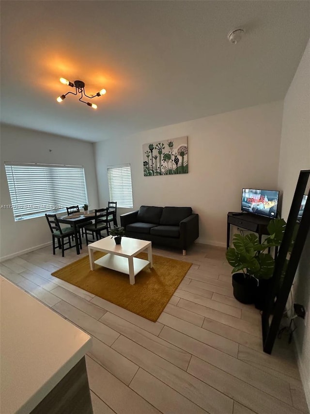 living room with light hardwood / wood-style floors