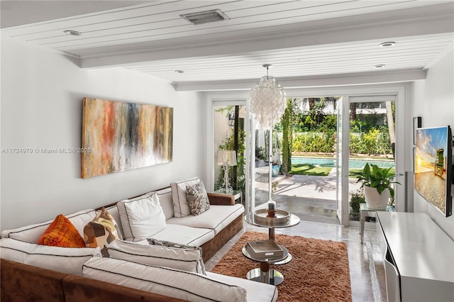 living room with wooden ceiling, beam ceiling, and an inviting chandelier