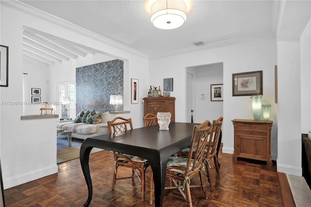 dining space with ornamental molding, dark parquet floors, and vaulted ceiling with beams