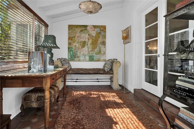 sitting room featuring dark tile patterned floors, wood ceiling, and vaulted ceiling with beams