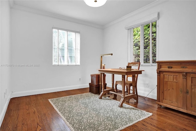 office area with dark hardwood / wood-style floors and ornamental molding