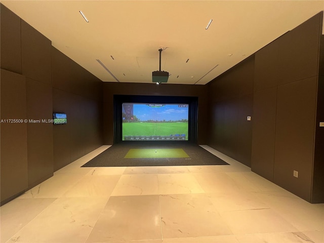 game room with golf simulator