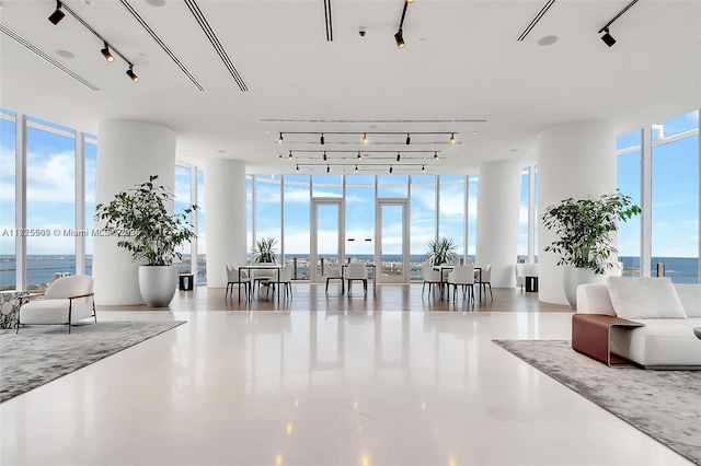 building lobby featuring a water view