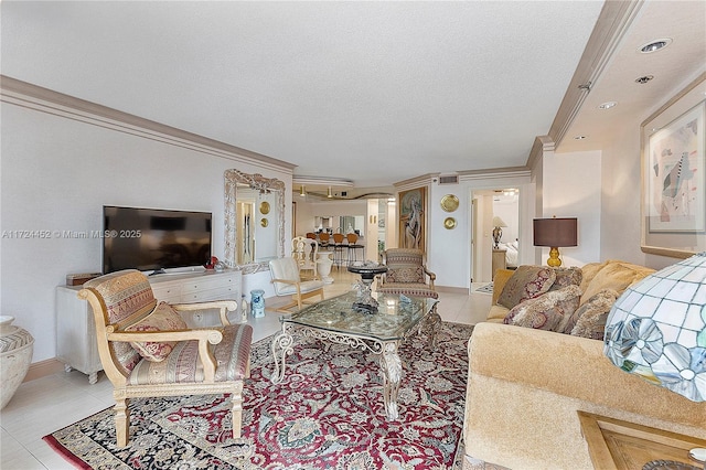 living room with a textured ceiling, light tile patterned flooring, and crown molding