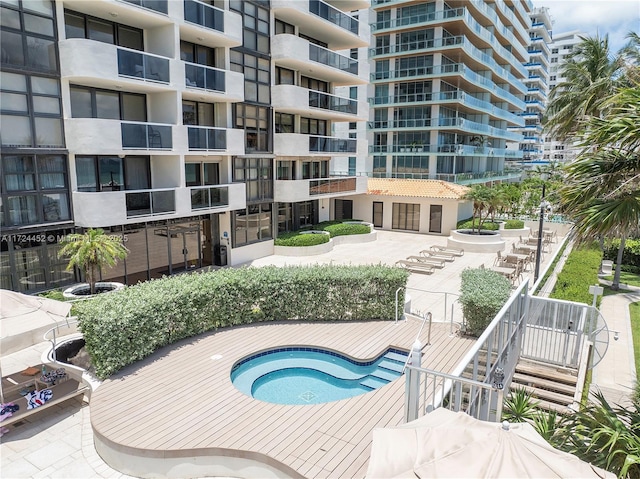 view of swimming pool featuring a patio area