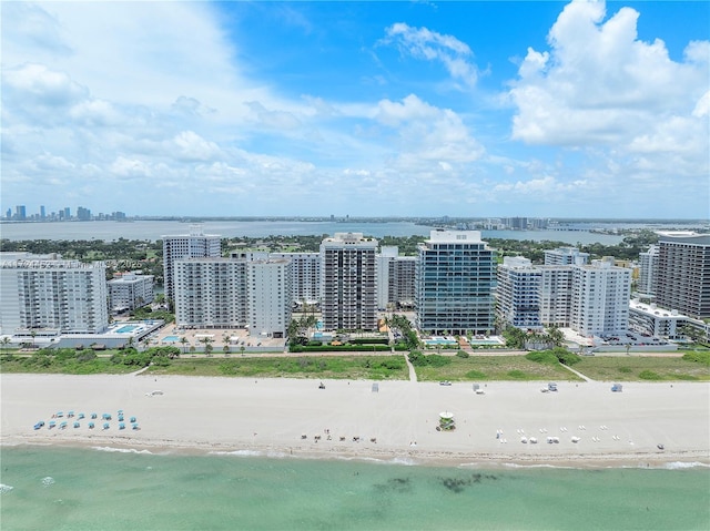 aerial view with a view of the beach and a water view