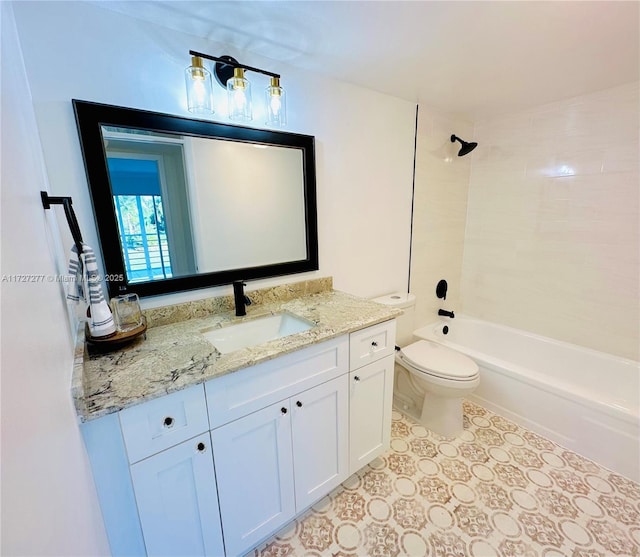 full bathroom with toilet, tiled shower / bath combo, and vanity