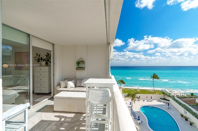 balcony featuring a water view