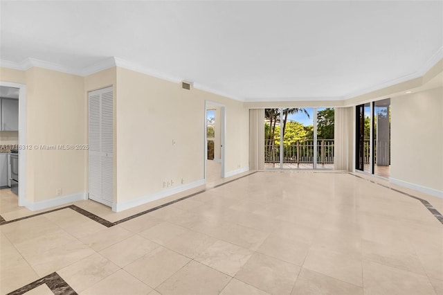 spare room with crown molding