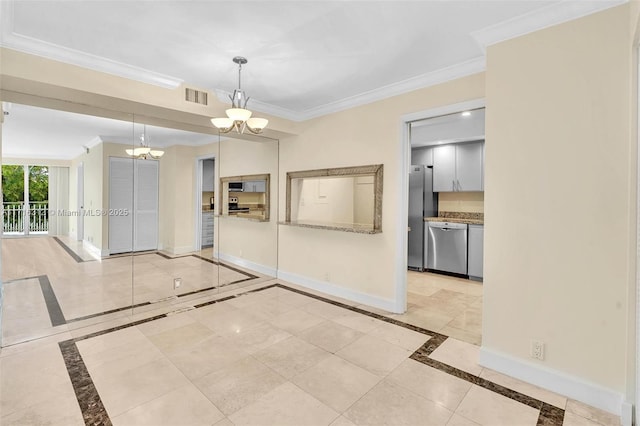 interior space featuring light stone countertops, stainless steel appliances, an inviting chandelier, hanging light fixtures, and ornamental molding