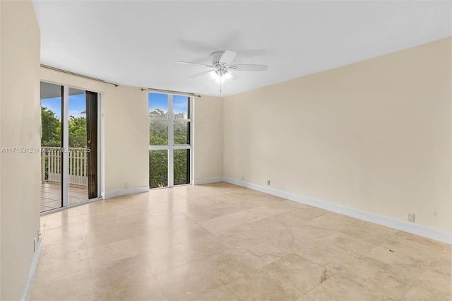 empty room featuring ceiling fan