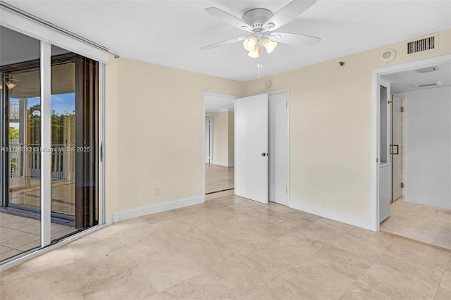 spare room featuring ceiling fan