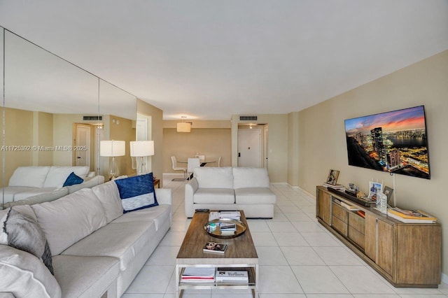 living room featuring light tile patterned floors