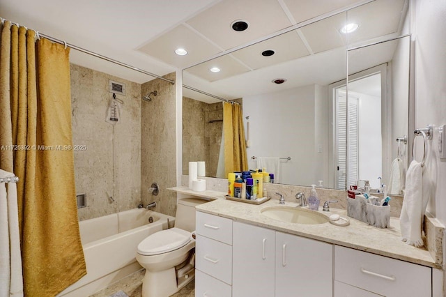 full bathroom featuring toilet, vanity, and shower / tub combo