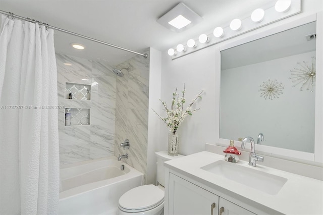 full bathroom featuring toilet, vanity, and shower / bath combination with curtain