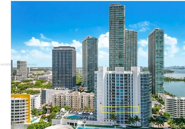 property's view of city featuring a water view