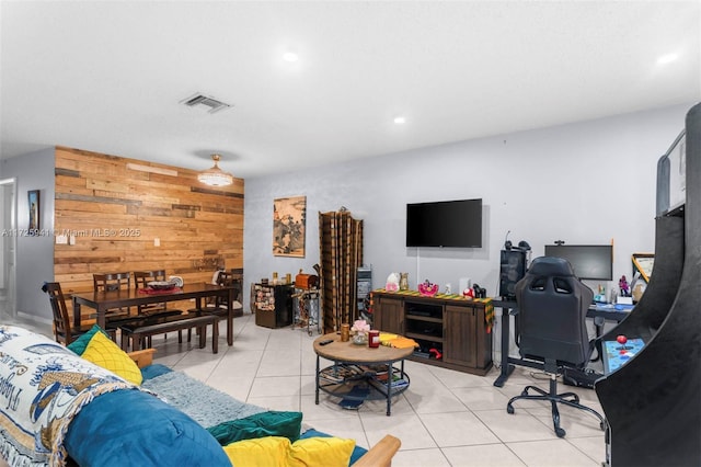 tiled living room featuring wooden walls