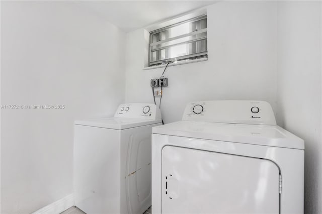 laundry area featuring independent washer and dryer