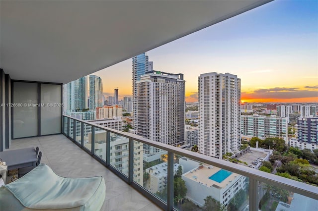 view of balcony at dusk