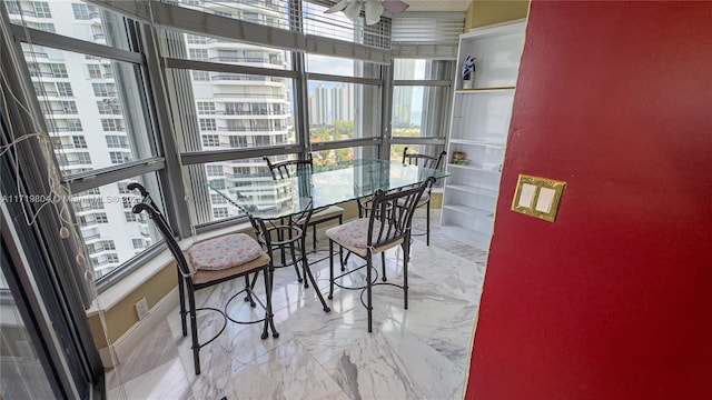 dining room with ceiling fan