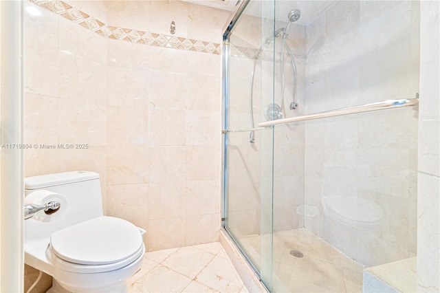 bathroom with toilet, tile patterned floors, and walk in shower