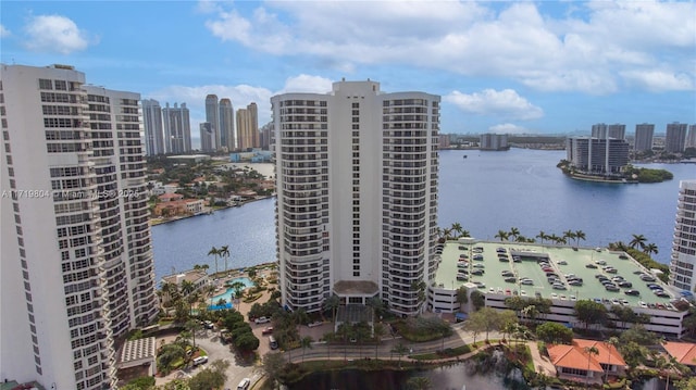 birds eye view of property featuring a water view