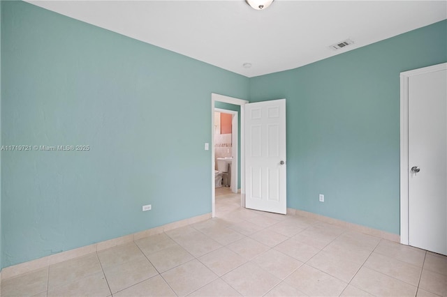 view of tiled spare room