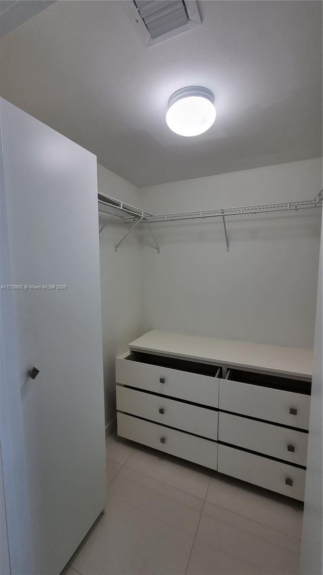 50 Biscayne Blvd Unit 1902, Miami, FL 33132 - walk in closet featuring light tile patterned flooring
