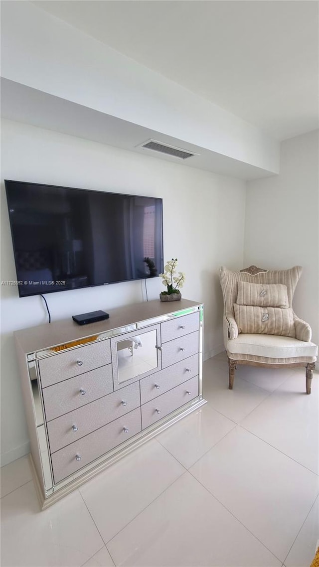 sitting room with light tile patterned floors