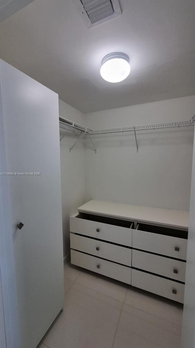 50 Biscayne Blvd Unit 1902, Miami, FL 33132 - walk in closet featuring light tile patterned floors