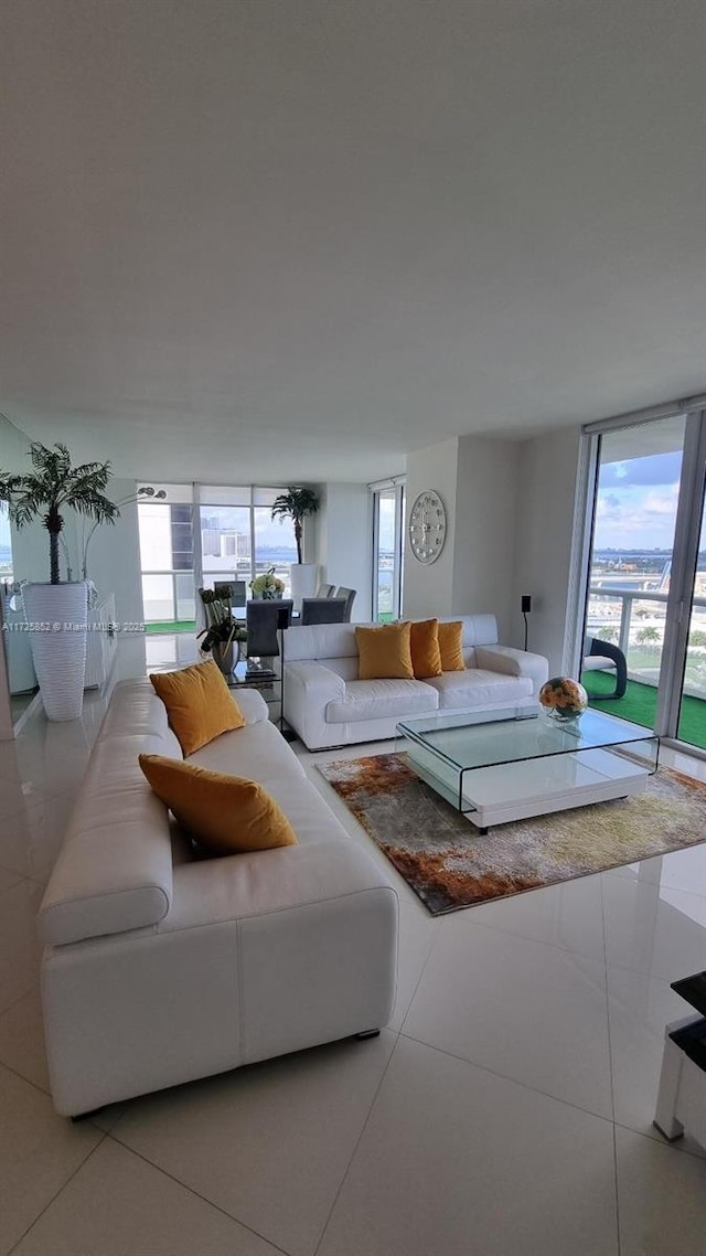 tiled living room with expansive windows